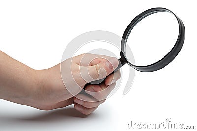 Man's hand holding magnifying glas Stock Photo