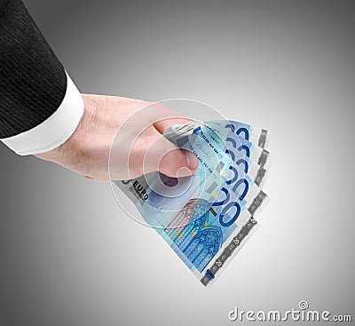 Man's Hand Holding Twenty Euro Notes Stock Photo