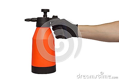 A man`s hand holds hand-pumped sprayer isolated on white background. Garden pressure sprayer for dispensing fertilizer, pesticide Stock Photo