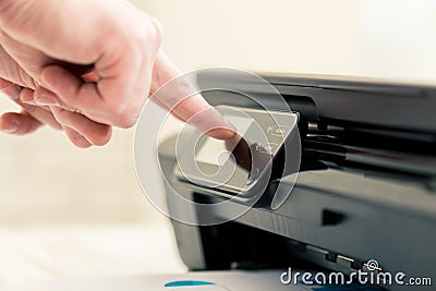 Man's hand making copies Stock Photo