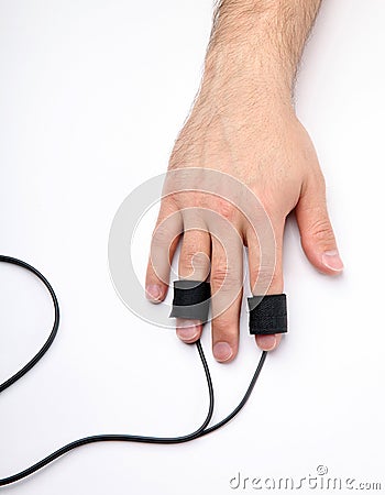 Man's Hand with Polygraph Electrodes Stock Photo