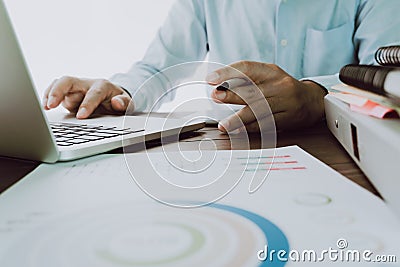 Man`s hand is pressing a computer keyboard. It`s a technology work. To make the work easier. Stock Photo