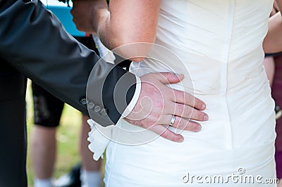 Man's hands hugging female booty, close-up Stock Photo