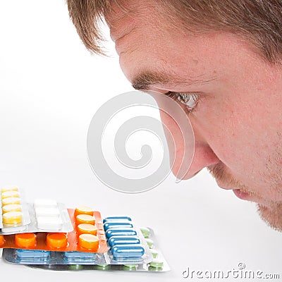 Man's head and colorful medicines Stock Photo