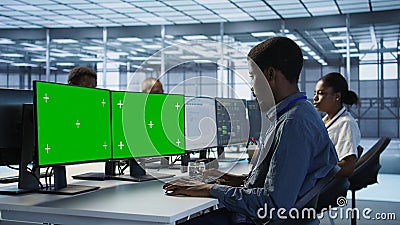 Man safeguarding data center against hackers with isolated screen computer Stock Photo