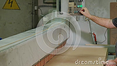 A Man Saws Wooden Door Blanks On The Machine The Production Of Village Interior Doors Wood Industrial