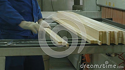 A Man Saws Wooden Door Blanks On The Machine The Production Of Village Interior Doors Craftsman Machinery