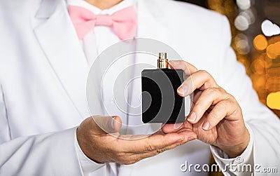 Man scent perfume. Perfume or cologne bottle. Fashion cologne bottle. Rich man prefers expensive fragrance smell Stock Photo