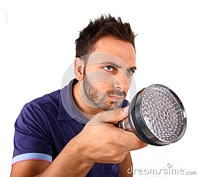 Man searching with flashlight. Stock Photo