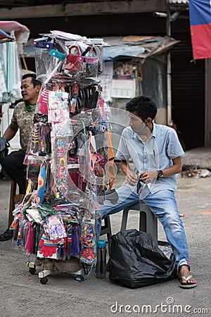 Jakarta, Indonesia - June 15, 2020: This man selling the fabric mask Editorial Stock Photo