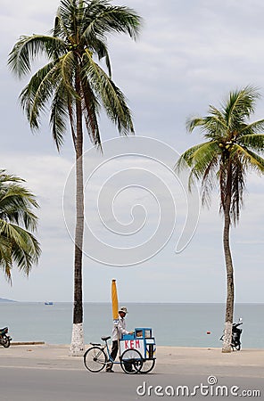 A man selling ice cream on street in Nha Trang, Vietnam Editorial Stock Photo