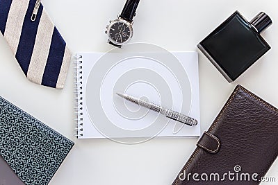 Man set: watch, tie, tie clip, pen, perfume, wallet and notepad Stock Photo