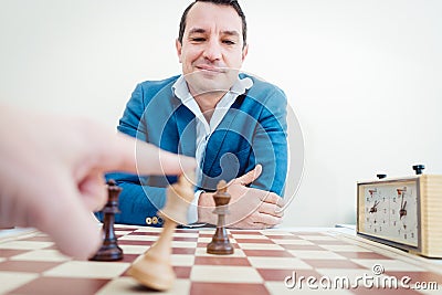 Man setting woman checkmate Stock Photo