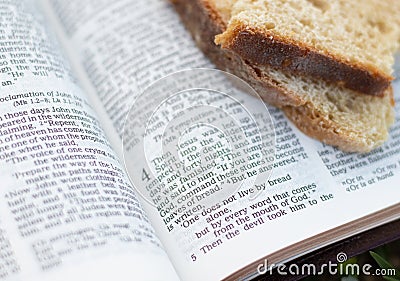 Man shall not live by bread alone but by every word that proceeds from the mouth of God Stock Photo