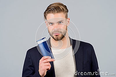 Man with shampoo or conditioner bottle Stock Photo