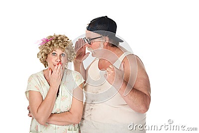 Man sharing a secret with a woman Stock Photo