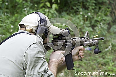 Man Shooting Carbine Stock Photo