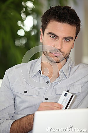 Man shopping on the internet Stock Photo