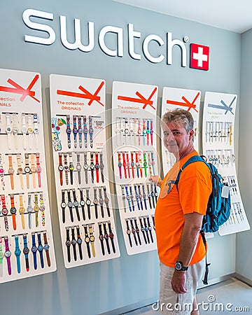 Man shopping at the Swatch store Editorial Stock Photo