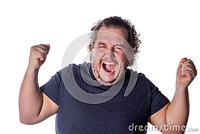 Man shouts, lifting his hands up into fists. Excited man celebrating success with hands raised against white background Stock Photo