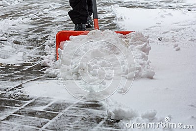 Man shoveling snow Stock Photo