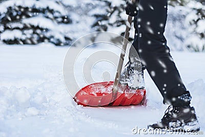 Man shoveling snow Stock Photo