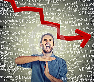 Man showing time out hand gesture, frustrated screaming to stop stress Stock Photo