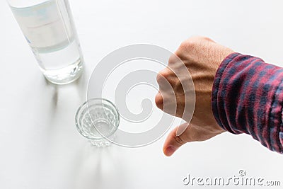 The man shows a sign that alcohol is bad Stock Photo