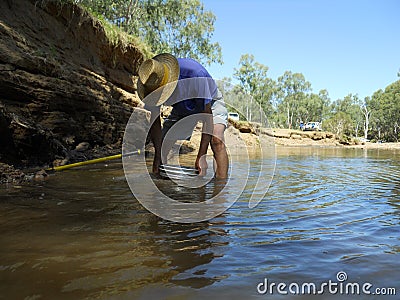 Man,sieving for sapphires Editorial Stock Photo