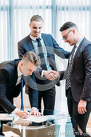 Man sign contract business partner deal closing Stock Photo