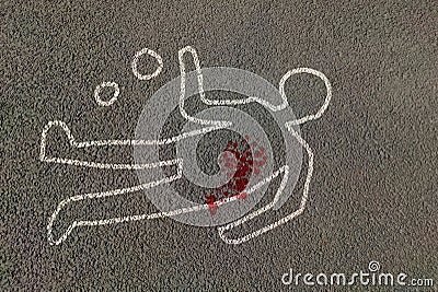 Man silhouette shape outline of dead body marked on road by chalk with evidence circled with blood strain on highway. Stock Photo