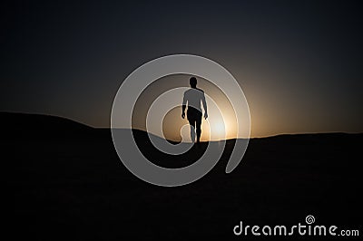 Man silhouette at sunset sky, future and success, people and nature Stock Photo