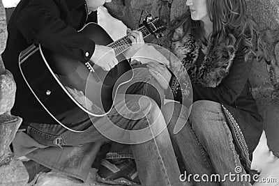 Man Singing Love Song to Fiance Stock Photo