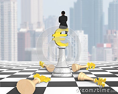 Man sitting on Euro symbol of money chess on chessboard Stock Photo