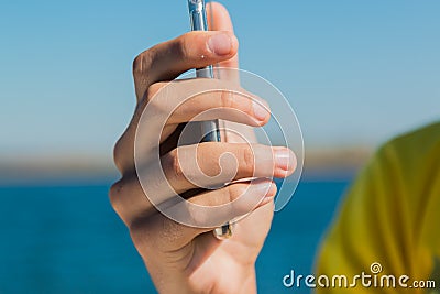 A man with smarphone in your hands taking photos Stock Photo