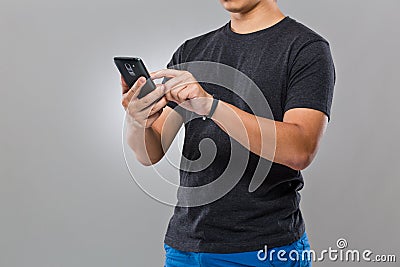 Man with smart device and use of mobile phone Stock Photo