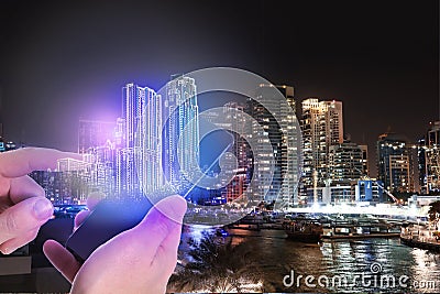 Man with smartphone and virtual image of building. Modern technology Stock Photo