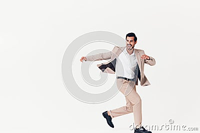 man smiling beige business winner happy white running suit businessman victory Stock Photo