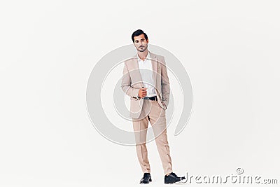 winner man smiling beige businessman background business suit model happy running victory Stock Photo