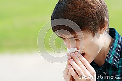 Man sneezing Stock Photo