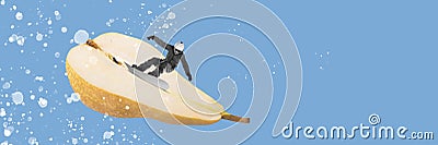 Man on snowboard sliding down the pear over blue background. Banner. Contemporary art collage. Stock Photo