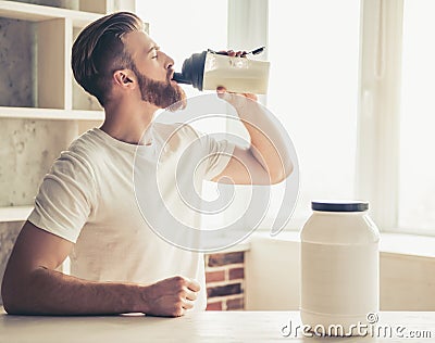 Man with sport nutrition Stock Photo