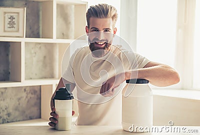 Man with sport nutrition Stock Photo