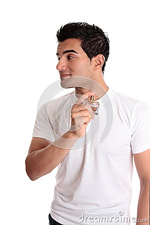 Man spraying perfume cologne to his neck Stock Photo