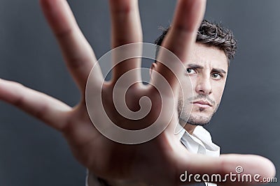 Man with spread hand Stock Photo