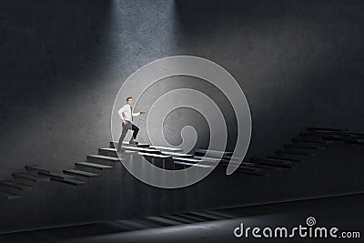 Man on staircase Stock Photo