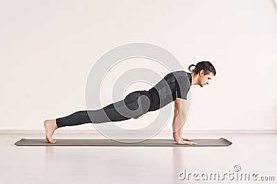 Man stand at plank. Home sport static training Stock Photo