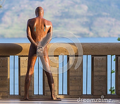 Man standing akimbo Stock Photo