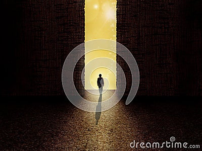 Man standing on the border of darkness and light Stock Photo