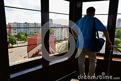 Man standing inside the Tower Lighthouse Editorial Stock Photo